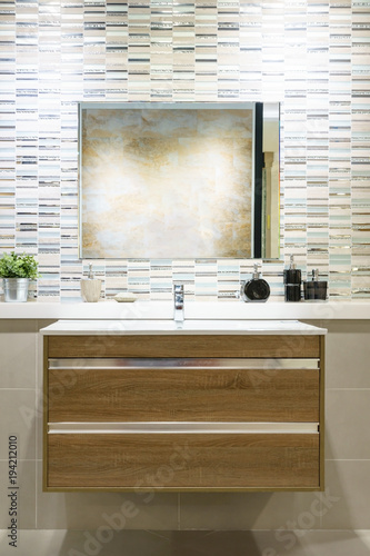 Interior of bathroom with sink basin faucet and mirror. Modern design of bathroom