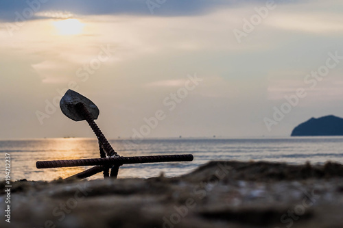 The anchor was placed on the sand on the day of boat landing