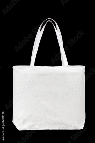 Tote bag canvas white cotton fabric cloth for shoulder eco shopping sack mockup blank template isolated on black background (clipping path)