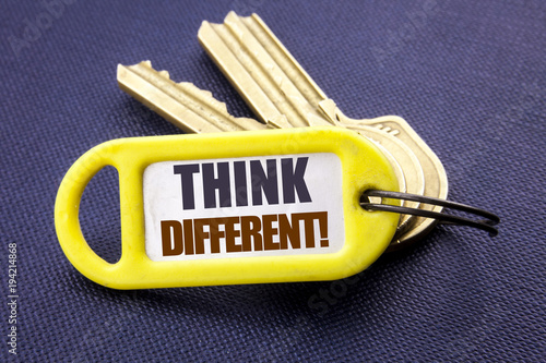 Handwriting Announcement text showing Think Different. Business concept for Outside Box Creative Written on key holder note black background with space close up photo