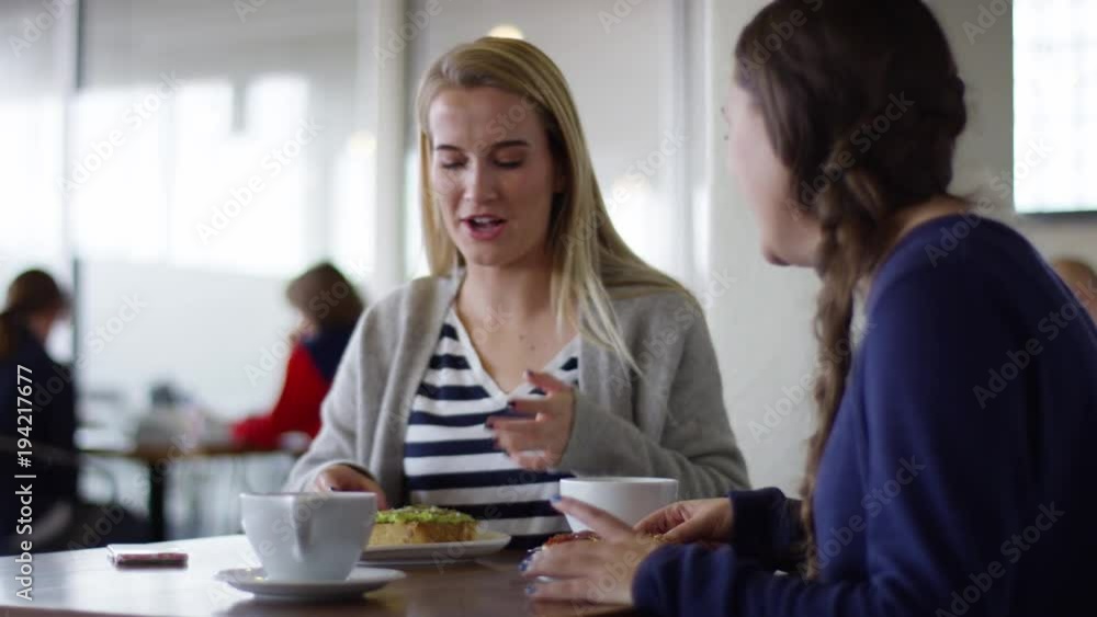 Blonde Takes Big First Bite Of Her Avocado Toast, She And Her Friend Both Laugh - Shot On Red Scarlet-W Dragon In 4K/ Slow Motion Blonde Takes Big First Bite Of Her Avocado Toast, She And Her Friend Both Laugh - Shot On Red Scarlet-W Dragon In 4K/ Slow Motion