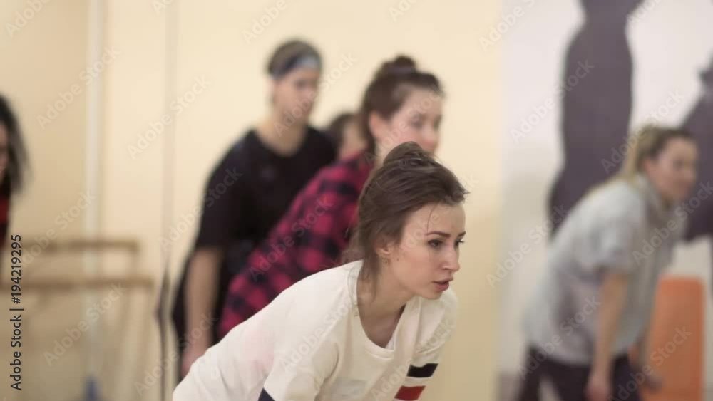 Young people have a dance rehearsal in light studio Young people have a dance rehearsal in light studio