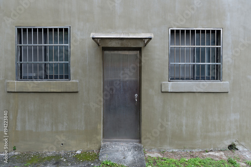 sidewalk by street wall & door