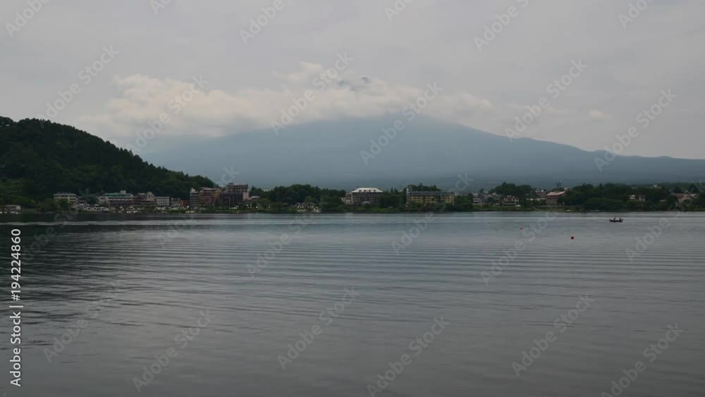 Mt. Fuji over Lake Kawaguchi on a Cloudy Day in Summer Mt. Fuji over Lake Kawaguchi on a Cloudy Day in Summer