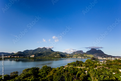 Beautiful view of mountains near lake in Rio de Janeiro, Brazil photo