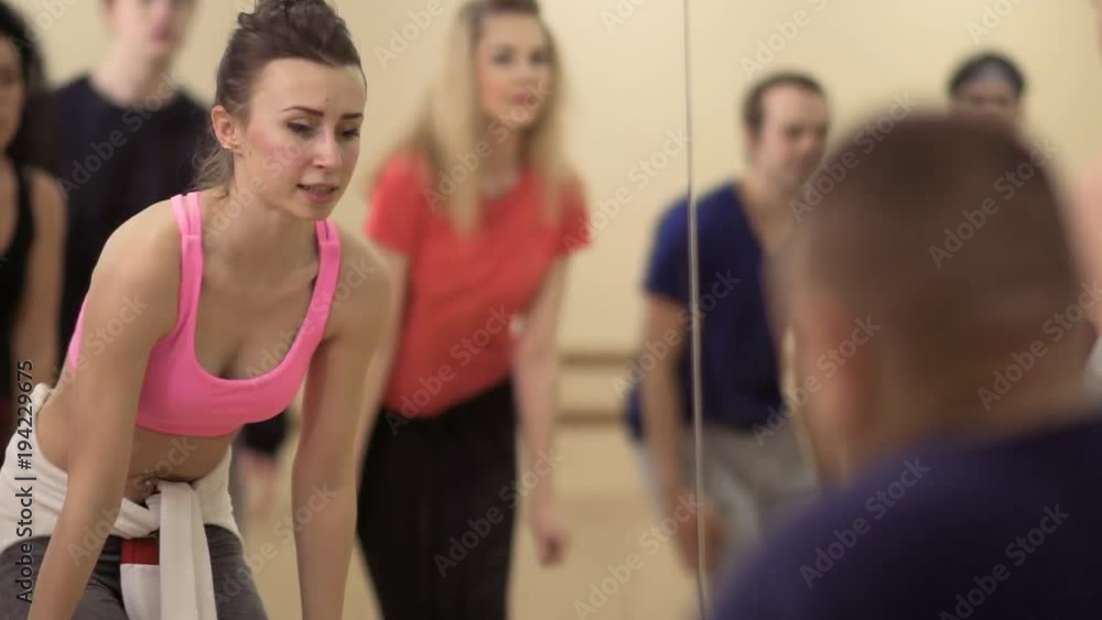 Young people are dancing in front of the mirror Young people are dancing in front of the mirror
