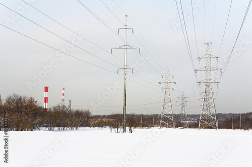 High voltage power lines in winter.