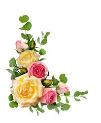 Rose flowers with eucalyptus leaves in a corner arrangement