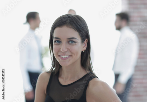 portrait of young business woman on blurred background.
