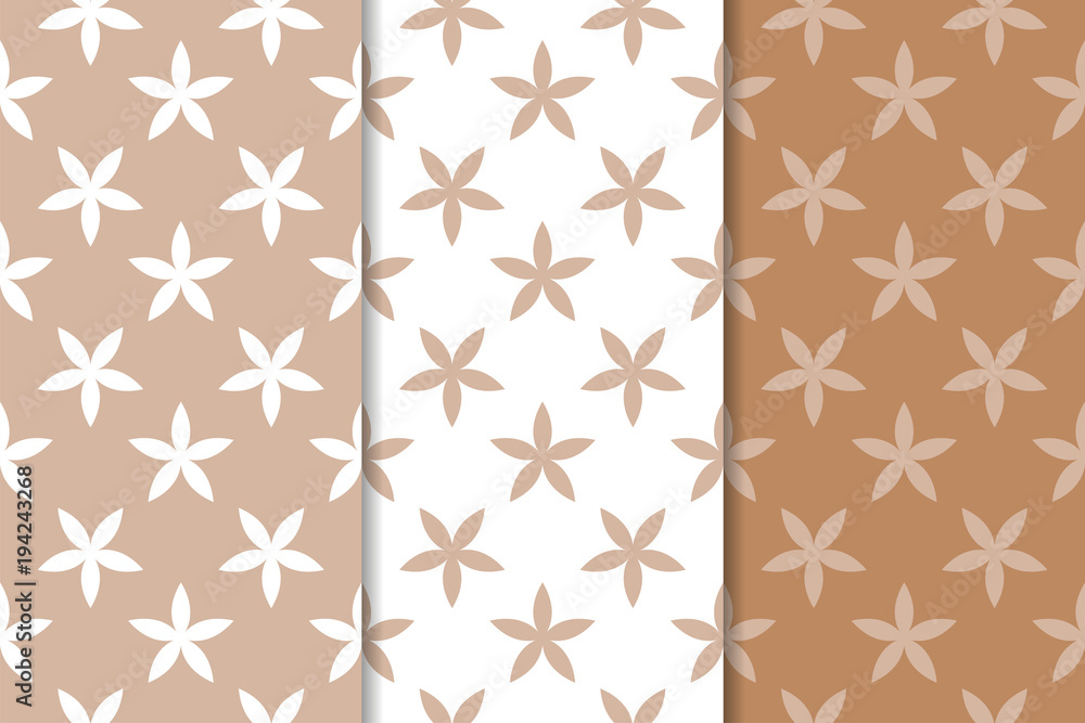 Brown floral ornaments. Set of vertical seamless patterns Brown floral ornaments. Set of vertical seamless patterns
