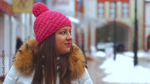 Young woman smile face in winter city photo