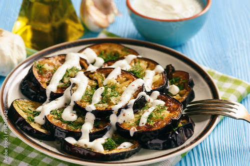 Fried eggplants with garlic and yogurt sauce.