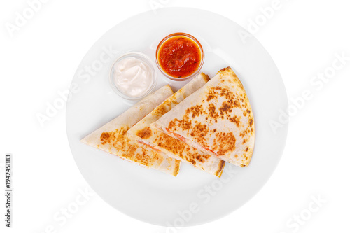 Quesadilla with chicken and tomatoes, two sauces from tomatoes and sour cream. isolated white. View from above