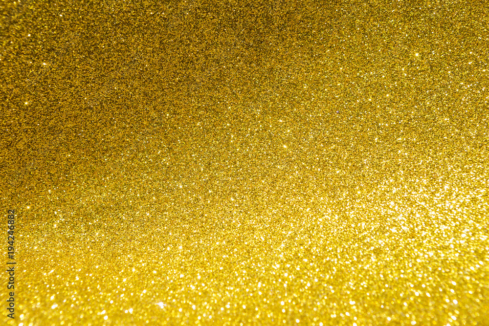 Gold glitter texture background, festive season concept background, shiny gold texture