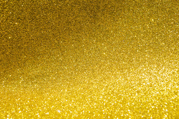 Gold glitter texture background, festive season concept background, shiny gold texture