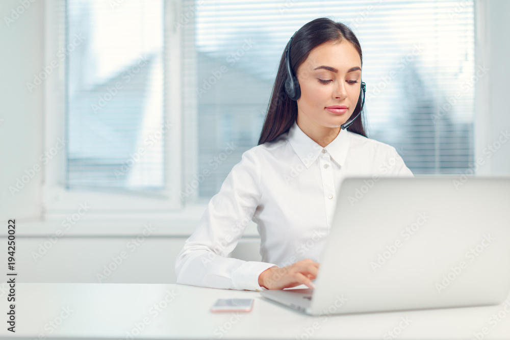 Support phone operator in headset at workplace Support phone operator in headset at workplace