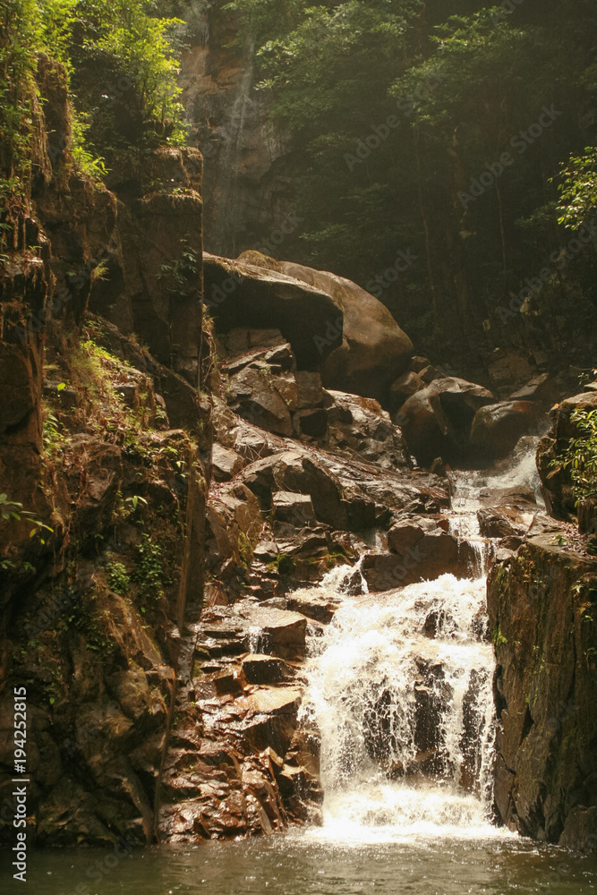 Fototapeta premium mountain waterfall in the jungle