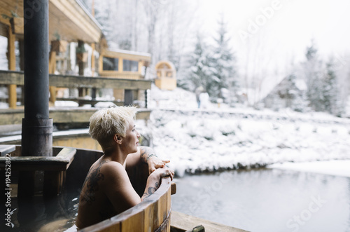 Woman relaxing in hot spring