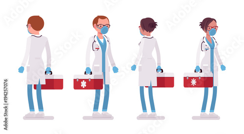 Male and female doctor standing with red box