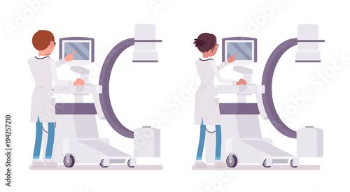 Male and female doctor doing x-ray