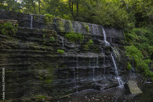 Waterfall in the mountain forest near village Ripit i Pruit, Catalonia, Spain