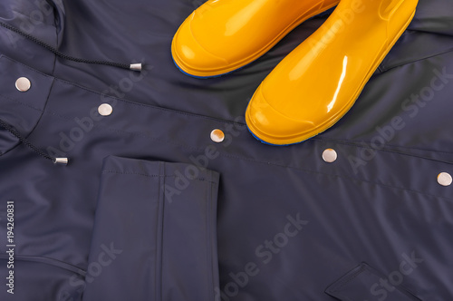 Rubber boots on a raincoat. photo