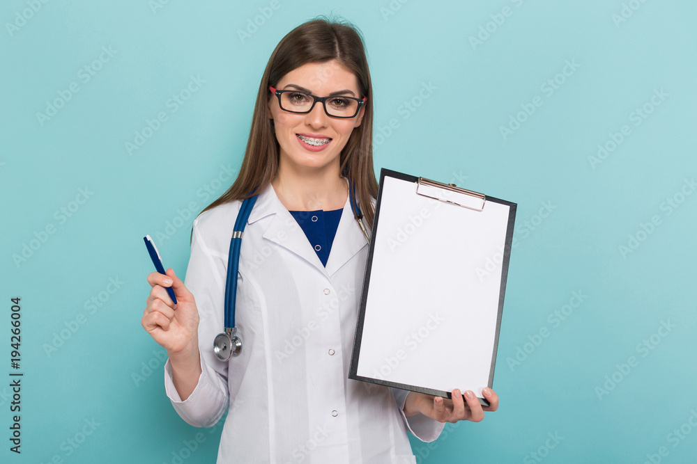 Female doctor in glasses with clipboard Female doctor in glasses with clipboard