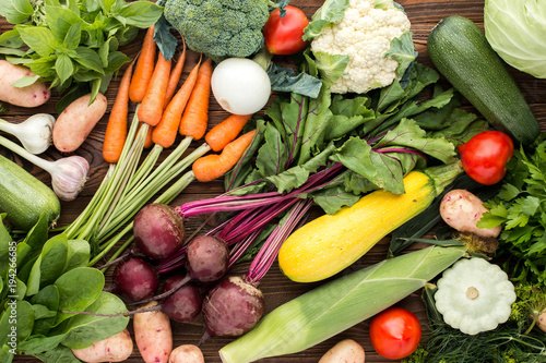 fresh vegetables  beet  carrot  zucchini  broccoli and others on wooden background  top view