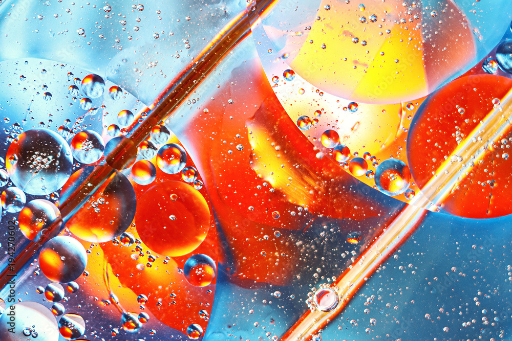 abstract colorful background, oil drops on water