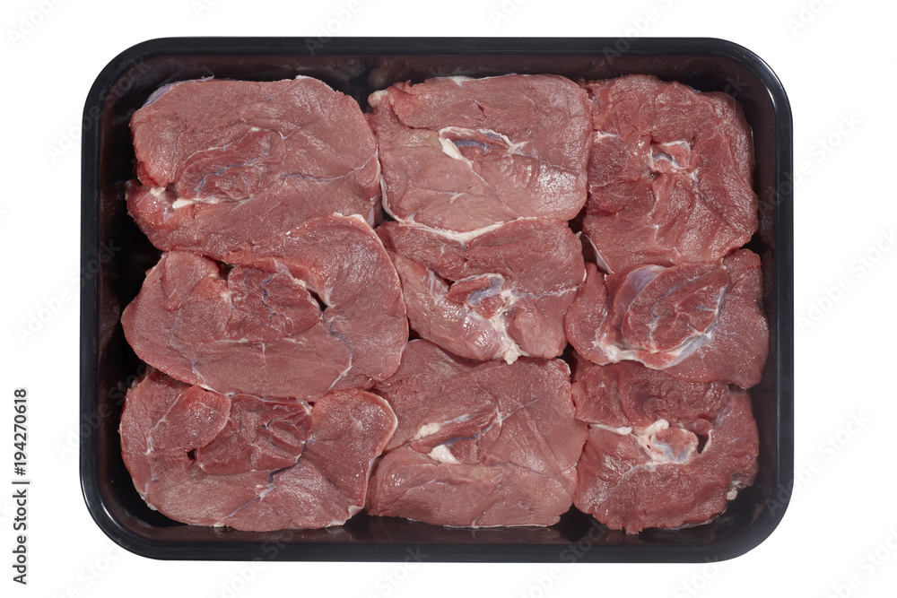 Supermarket plastic tray with veal isolated on white background. Top view Supermarket plastic tray with veal isolated on white background. Top view
