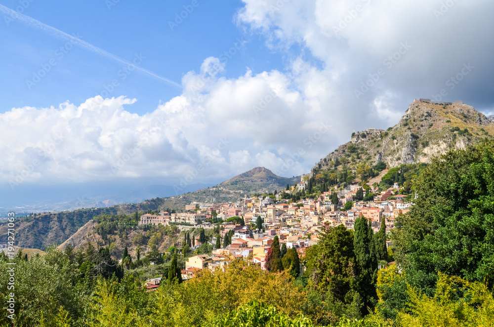 Sicilian lanscape with mountains and buildings