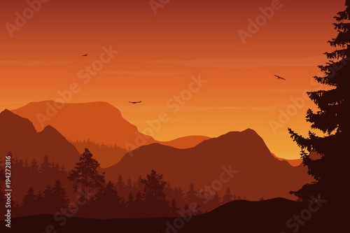 Mountain landscape with forest  under a orange sky
