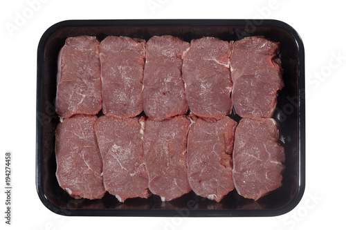 Plastic tray with lamb meat isolated on white background. Top view
