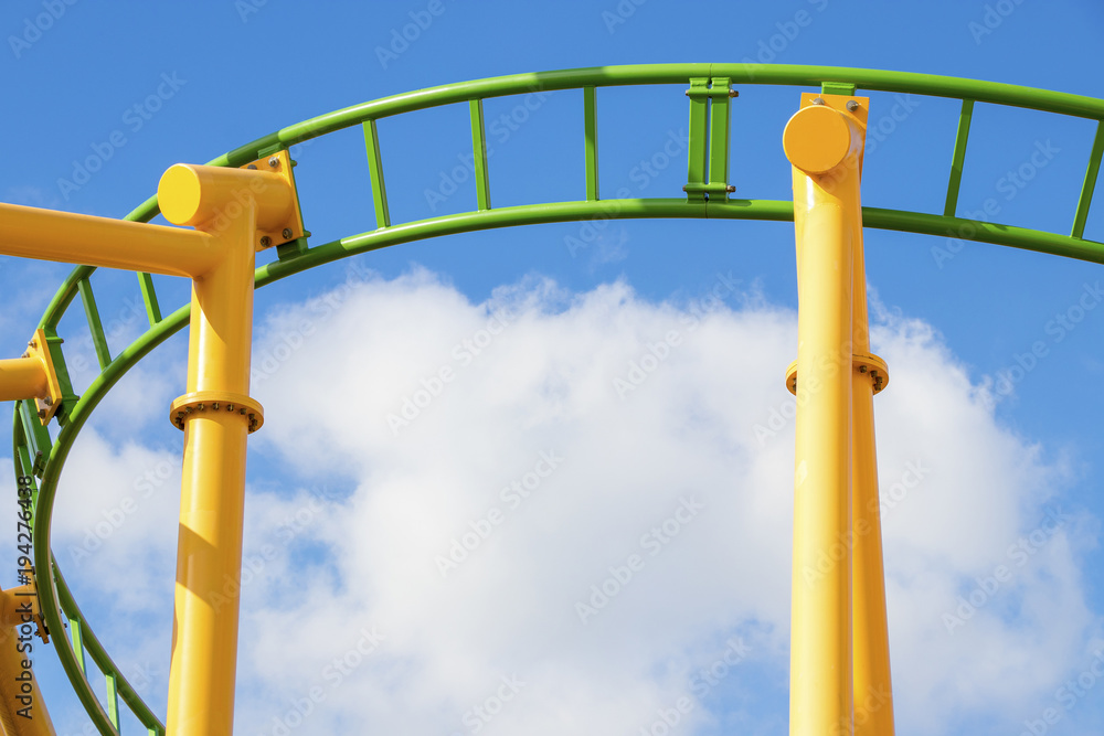 green yellow rollercoaster open cloudy blue sky green yellow rollercoaster open cloudy blue sky