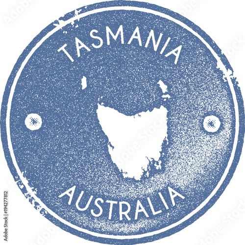 Tasmania map vintage stamp. Retro style handmade label, badge or element for travel souvenirs. Light blue rubber stamp with island map silhouette. Vector illustration.