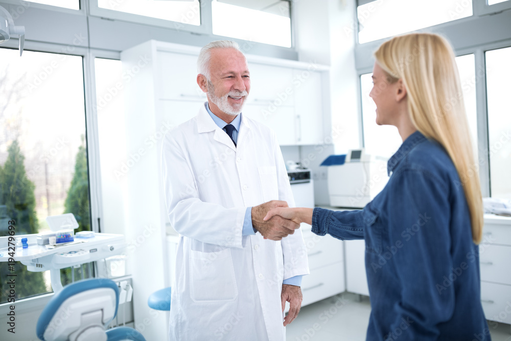 A mutual satisfaction after a successful treatment A mutual satisfaction after a successful treatment