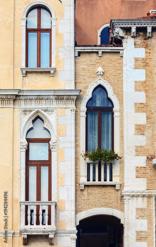 View of old window in historical buildings in Venice