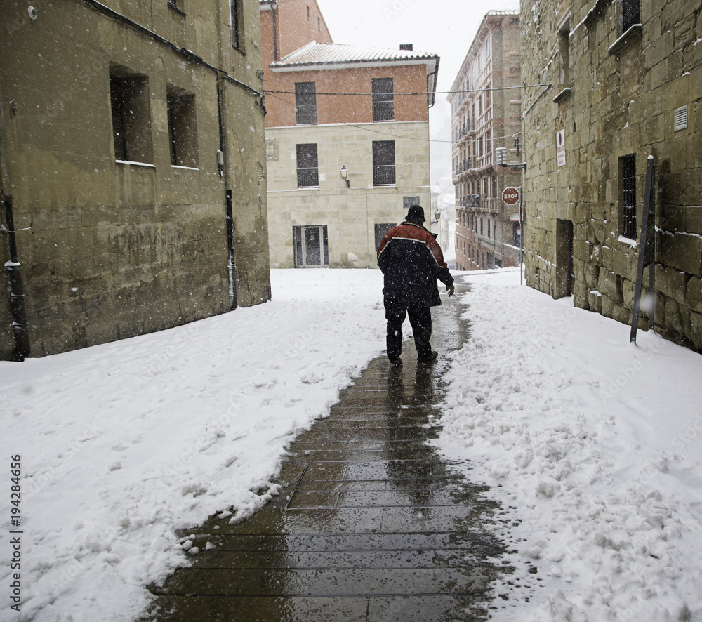 Man walking on snowy