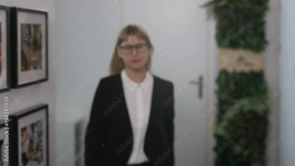 Young Blonde Businesswoman Walking Close to the Camera Young Blonde Businesswoman Walking Close to the Camera