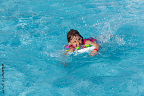 little girl in the swimming pool