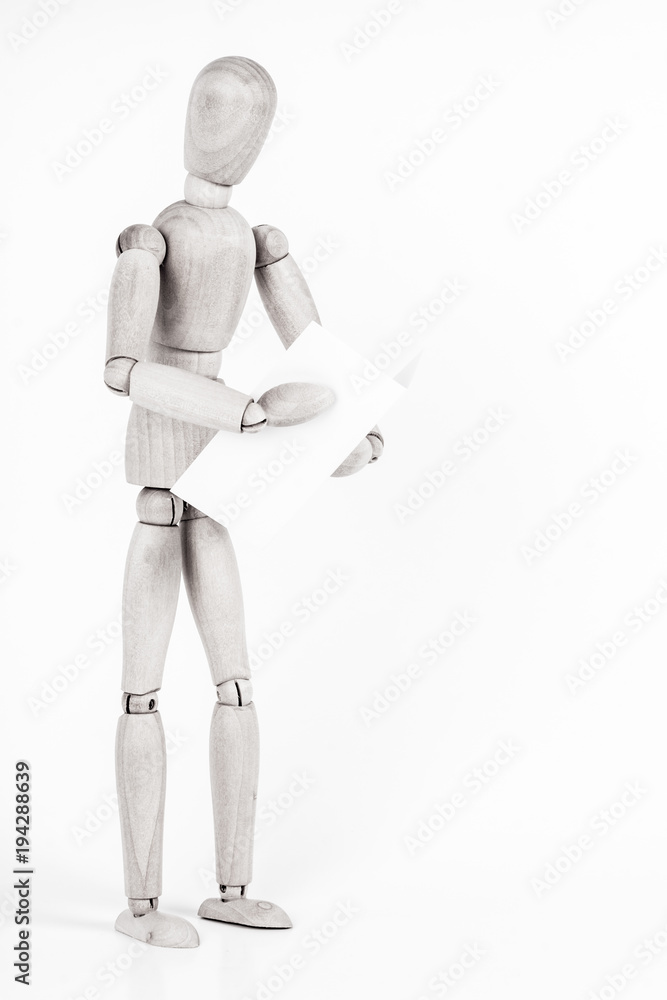 Puppet is standing and reading