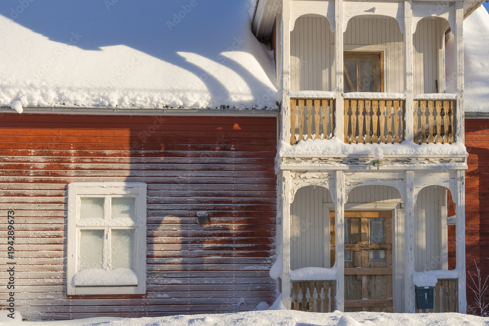 the winter in swedish Lapland. a frozen wood house