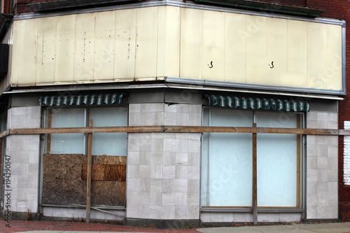 Abandoned brick building with peeling paint 