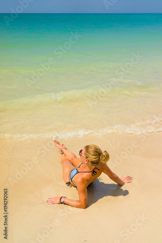 woman resting at the tropical Thailand Railay beach
