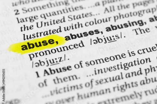 Highlighted English word "abuse" and its definition in the dictionary