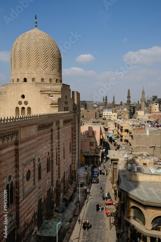 Looking down on a street in Cairo with minarets in the background