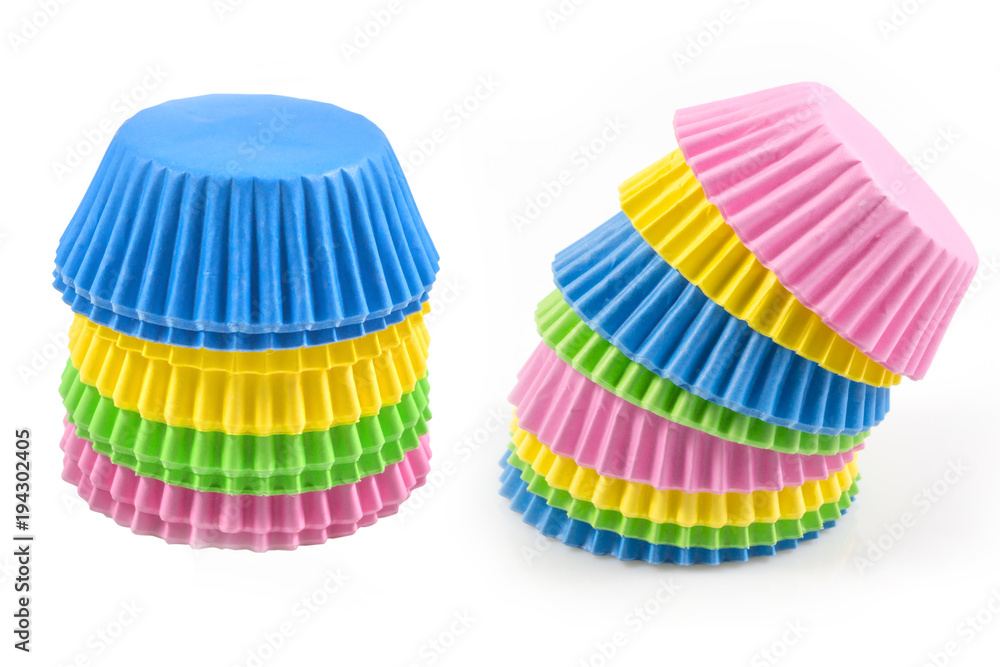 Colorful cupcake, paper cups, muffin cup isolated on white background, Stack of paper cupcakes, muffins on white background. Colorful cupcake, paper cups, muffin cup isolated on white background, Stack of paper cupcakes, muffins on white background.
