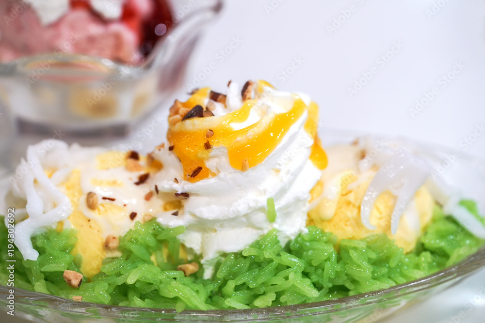 Mango ice cream sorbet with sticky rice and whipping cream Mango ice cream sorbet with sticky rice and whipping cream