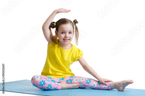 Child girl doing fitness ex...