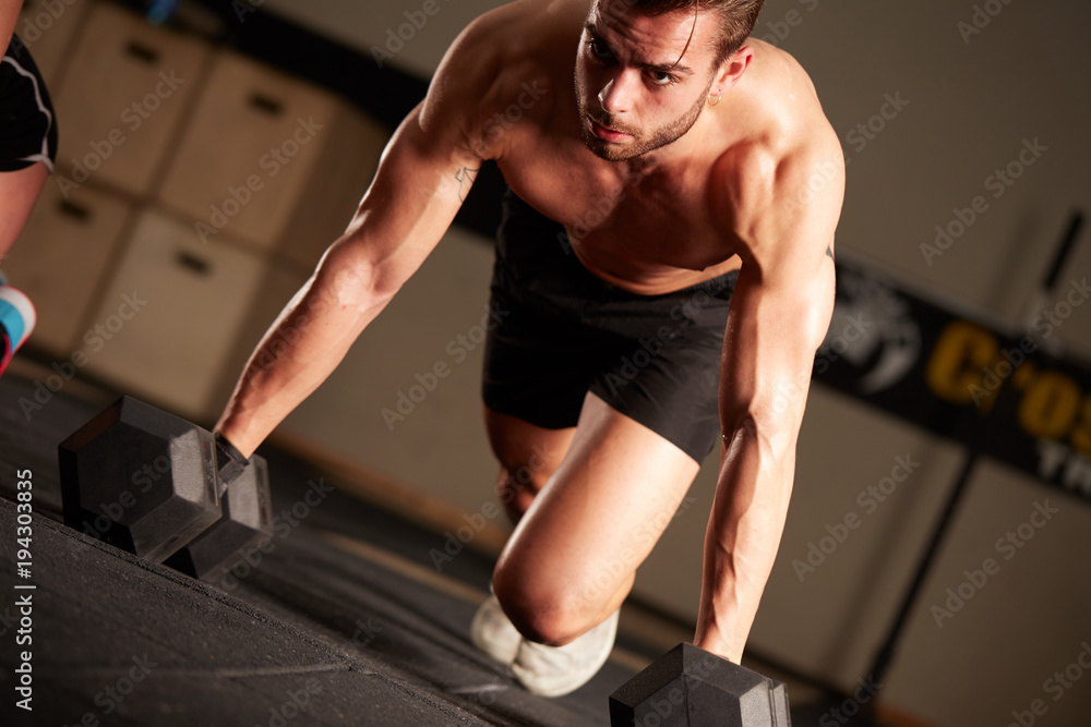 Obraz premium Crossfit lessons in fitness club
